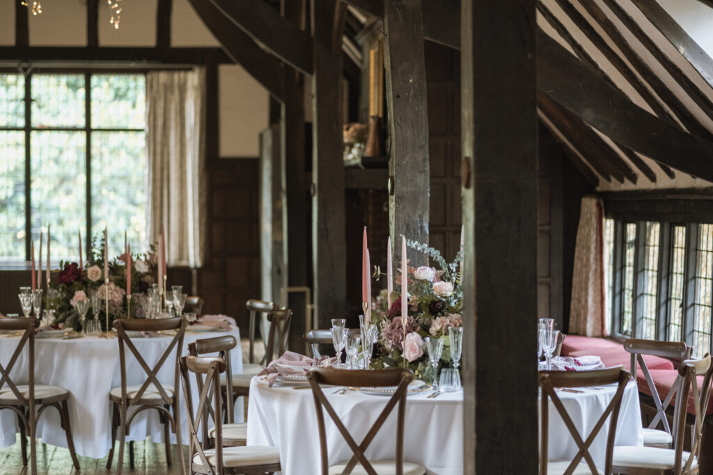Ramster Long Hall with open beams and tables dressed for a winter wedding