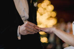 A wedding couple saying their vowels at Ramster Hall country house wedding venue